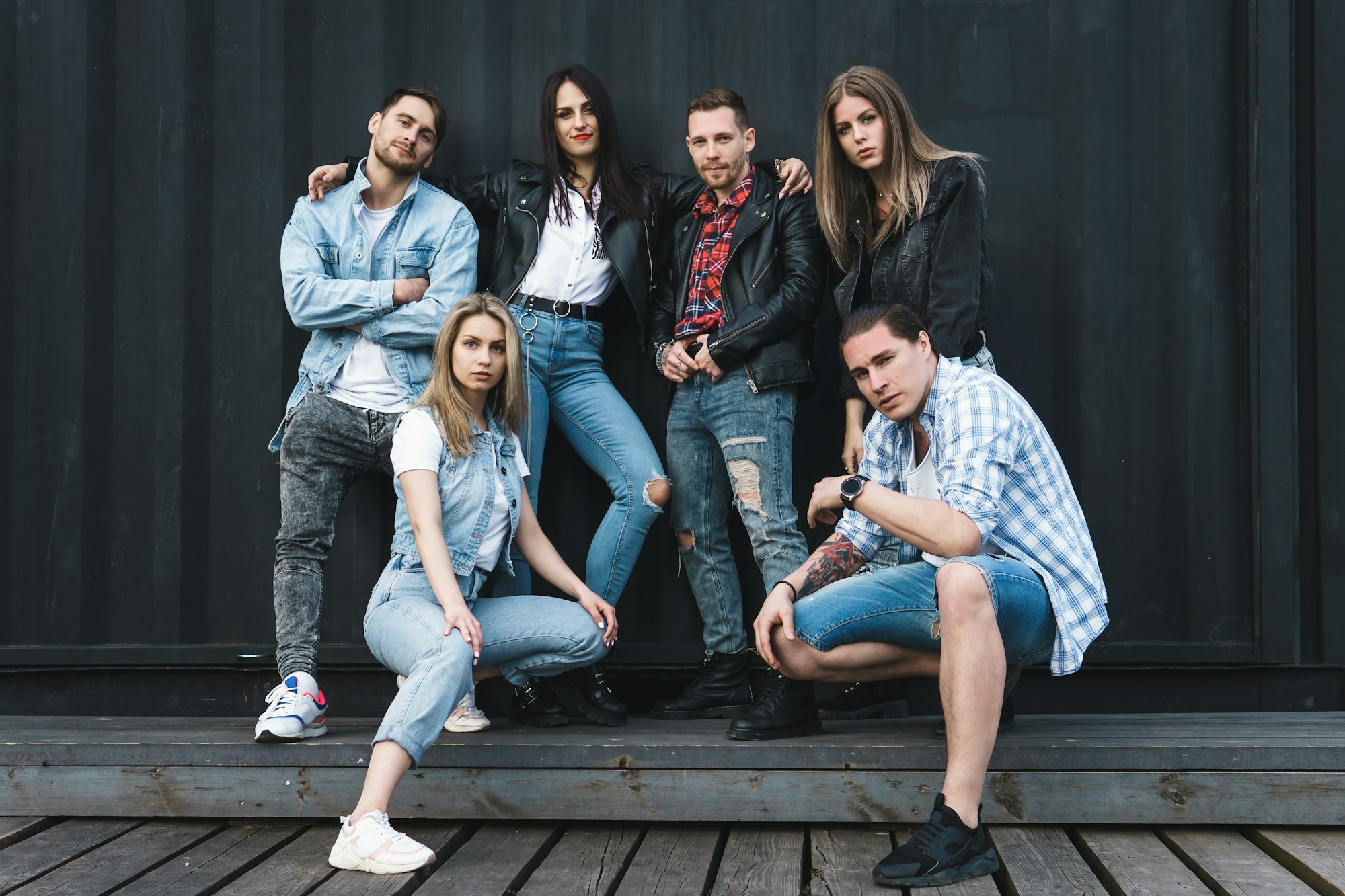 Group of young and stylish people outdoors.